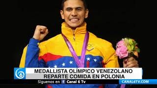 Medallista olímpico venezolano reparte comida en Polonia