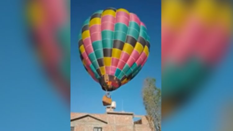 Globo aerostático impacta techo de casa en León