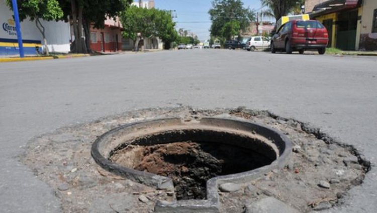 Localizan cuerpo de mujer en alcantarilla