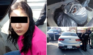 Detienen a mujer que llevaba un descuartizado en su carro en Jalisco