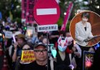 Ciudadanos japoneses se manifiestan en Tokio contra la reforma constitucional