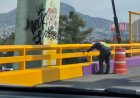 Repintan puentes en CDMX tras polémica por uso de color morado en infraestructura vial